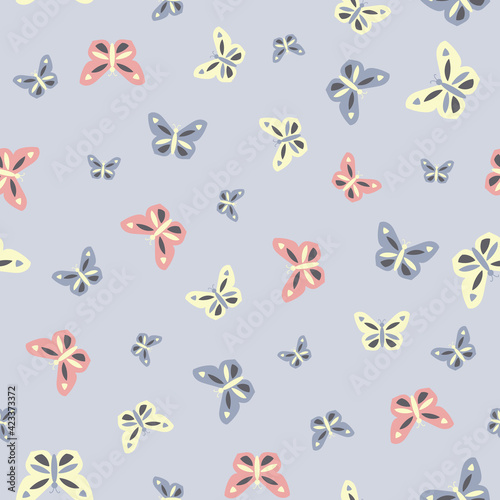 Colorful butterflies on light blue repeat seamless vector Background pattern © Kimberly