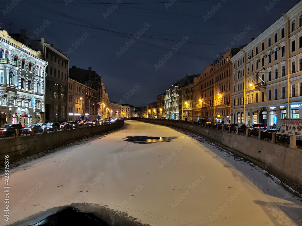 Saint Petersburg, Russia - January 6, 2021: Night view of the Moika River and its picturesque embankments