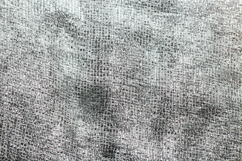 Grey shiny fabric background, fantastic