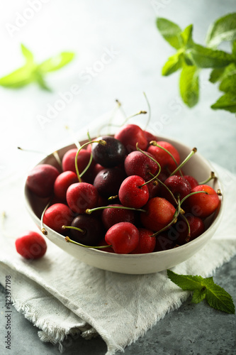 Ripe fresh cherry in a white bowl