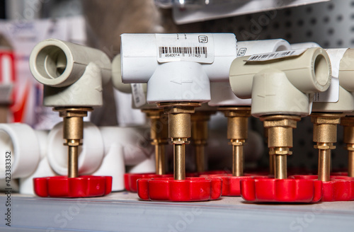 valve valve made of stainless steel, in the hardware store in the display case weighs