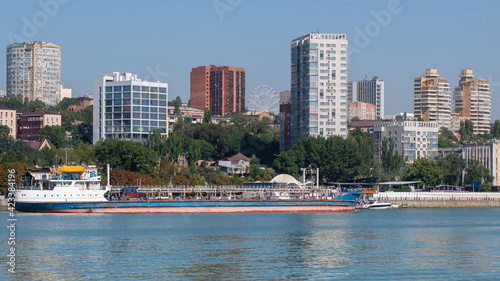 Fotografi View of Rostov-on-Don and Volgoneft barge floating on Don river