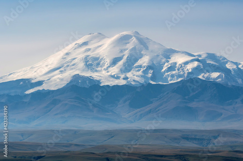 View of Mount Elbrus from Bermamyt plateau on sunny summer day. Karachay-Cherkessia, Caucasus, Russia. © Kirill