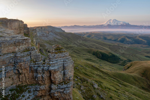 Sunrise view of mount Elbrus from Bermamyt plateau. Karachay-Cherkessia, Caucasus, Russia.