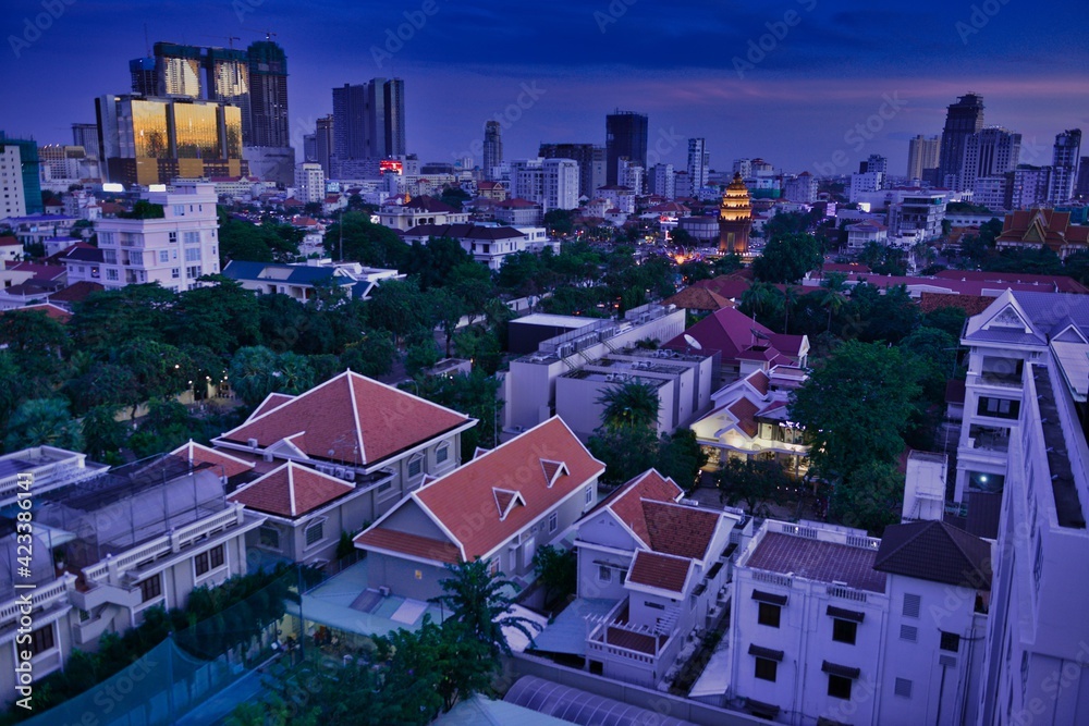 Naklejka premium View from a rooftop downtown at sunset (blue hour)