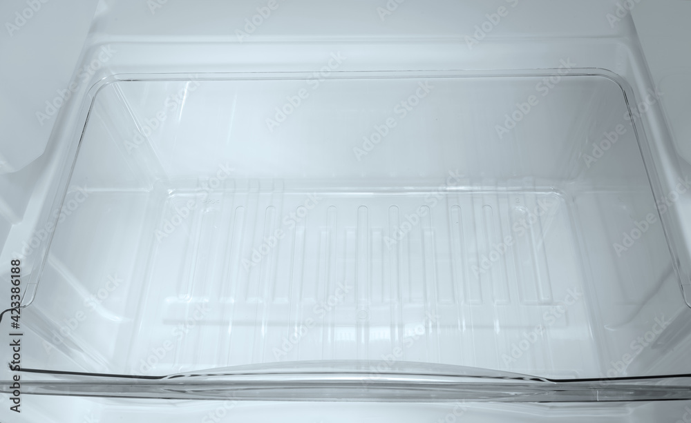Refrigerator open empty fridge inside interior. close up on empty refrigerator with door open. New clean refrigerator Refrigerator open empty fridge inside interior. close up on empty refrigerator with door open. New clean refrigerator