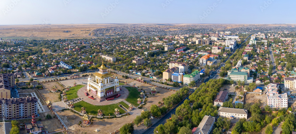 Panoramic aerial view of Elista town and Golden temple of the Buddha Shakyamuni on sunny day. Kalmykia, Russia.