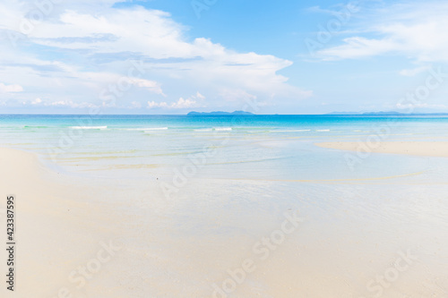 White sand empty sea beach sunny day blue sky