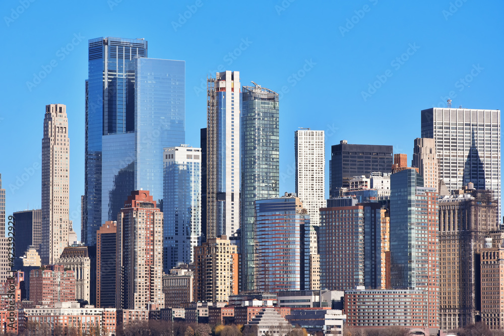 Buildings architecture of Manhattan, New York City seen from Ellis Island, New Jersey, USA.