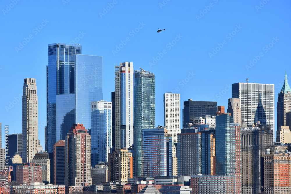 Fototapeta premium Buildings architecture of Manhattan, New York City seen from Ellis Island, New Jersey, USA.