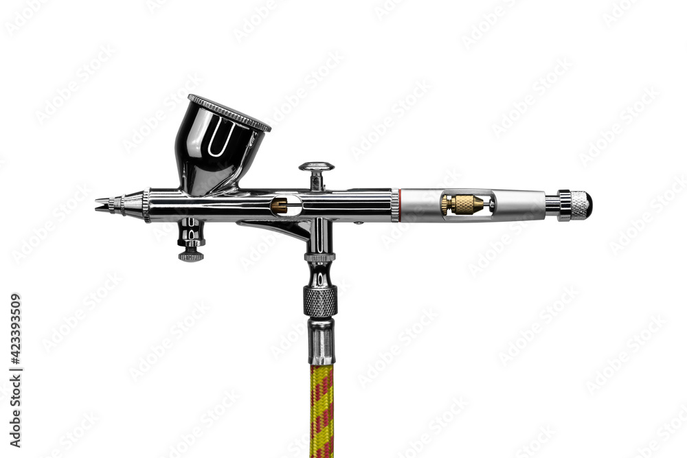 Fototapeta premium Airbrush spray isolated on white background