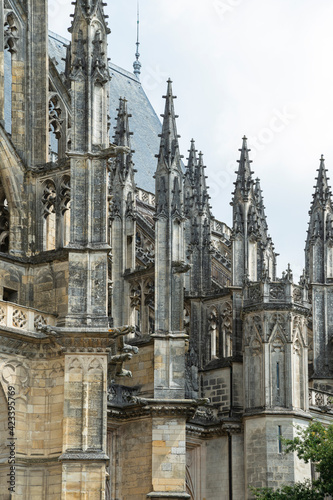 Pinnacles are architectural elements of a Gothic cathedral. Fragment of the construction of the Cathedral of the Holy Cross of Orleans, France.