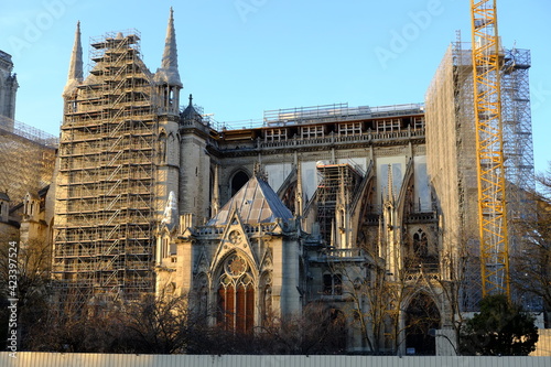 A ray of sunlight in the end of the day at Notre Dame, during its recontruction. March 2021, Paris France.