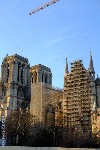 A ray of sunlight in the end of the day at Notre Dame, during its recontruction. March 2021, Paris France.