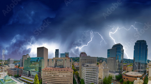 Storm approaching Portland, Oregon. City skyline with lightnings photo