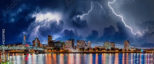 Storm approaching Portland, Oregon. City skyline with lightnings
