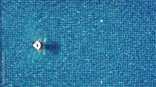 Footage 4k B-roll Drone aerial view of Young women over blue swimming pool enjoying Thailand. travel tourism holidays concept