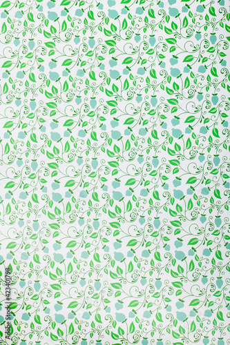 Green flowers and patterns on a white background