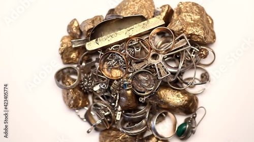 Wallpaper Mural Pile of silver and gold jewelry with jewels rotating 4K Torontodigital.ca