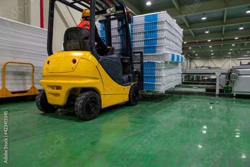 warehousing Forklift driver stacking pallets Pocket independent spring with  by stacker loader © mongkol