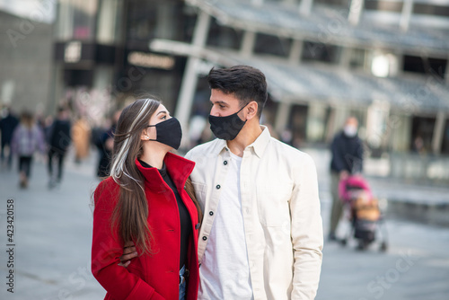 Portrait of a couple wearing masks, covid and coronavirus concept