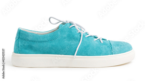 New blue suede walking shoe isolated on white background. Side view.
