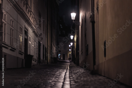 old street of Prague at night © konrad hryciuk