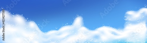 Beautiful blue background with realistic Soap foam with bubbles. Shampoo bubbles texture. Shiny washing hygiene detergent. Empty place for your text. Vector illustration