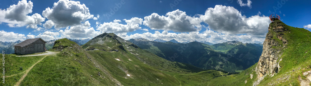 panorama of mountains with path, hut and view on the rock, Stubnerkogel, Austria