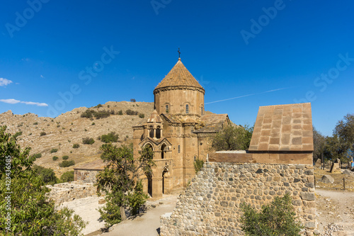 TThe Church of the Holy Cross or Holy Cross Cathedral on Akdamar Island was built by architect Manuel in 915-921 to house part of King Gagik I's True Cross. © satiozdemir
