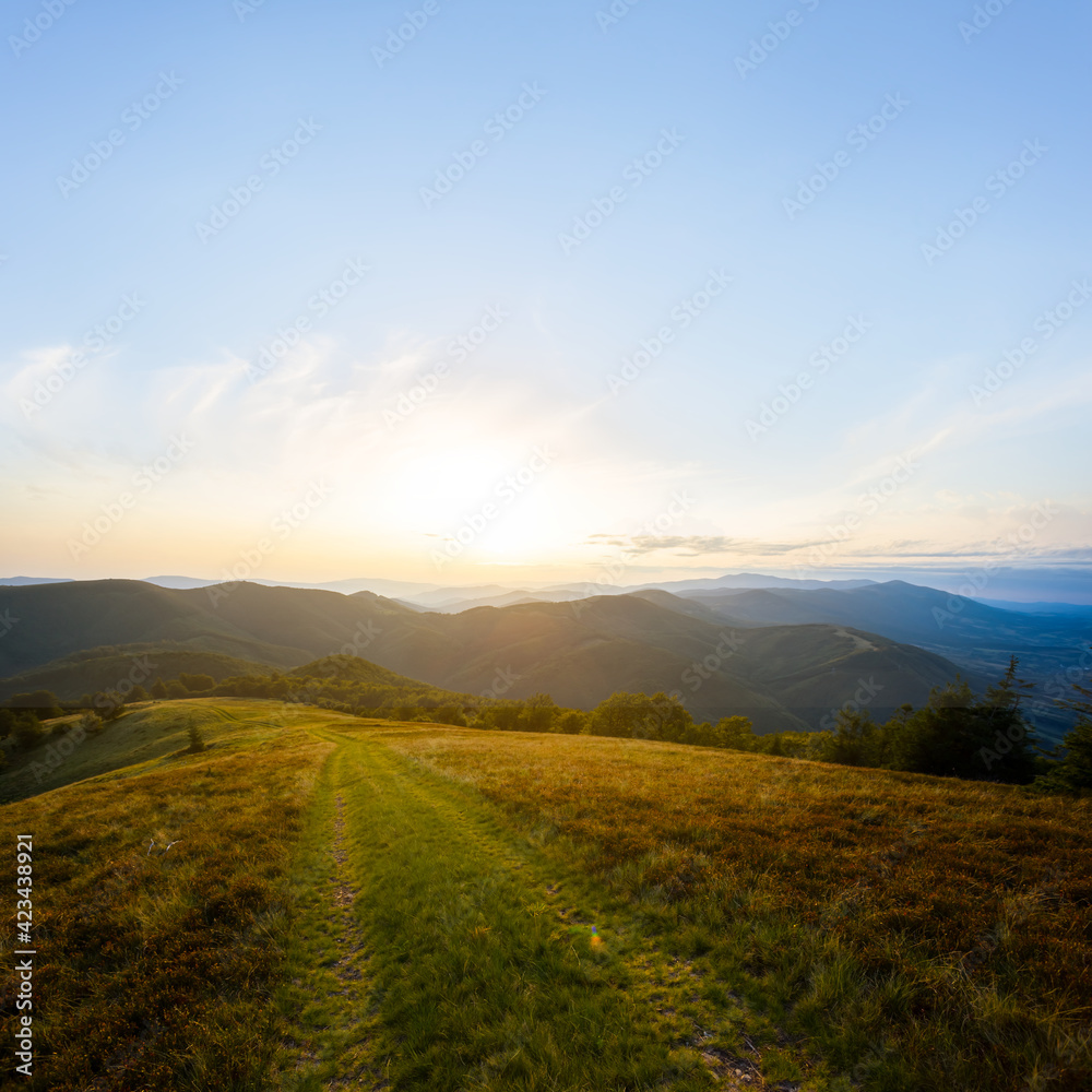 beautiful green mountain valley at the sunset, evening outdoor travel scene