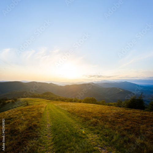 beautiful green mountain valley at the sunset, evening outdoor travel scene