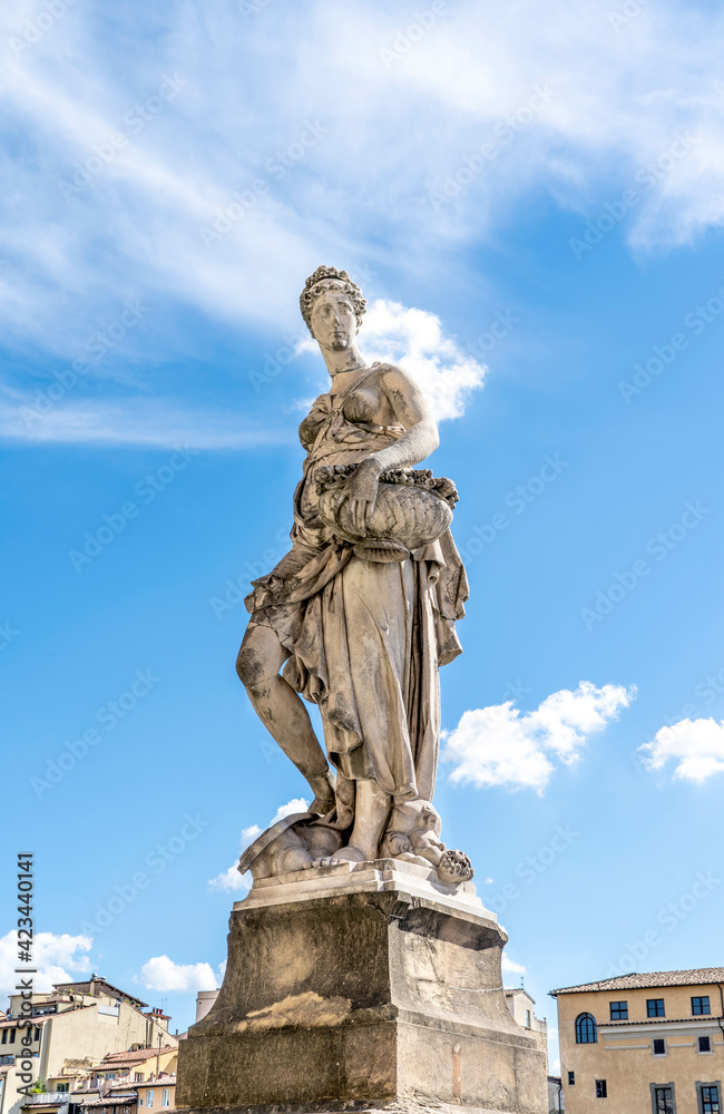 Statue of Spring, sculpted by Italian artist Pietro Francavilla in early 17th century on the Santa Trinita Bridge in Florence city center, Tuscany, Italy