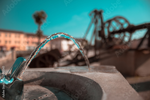 Zampillo d'acqua su fontanella a Palmanova photo