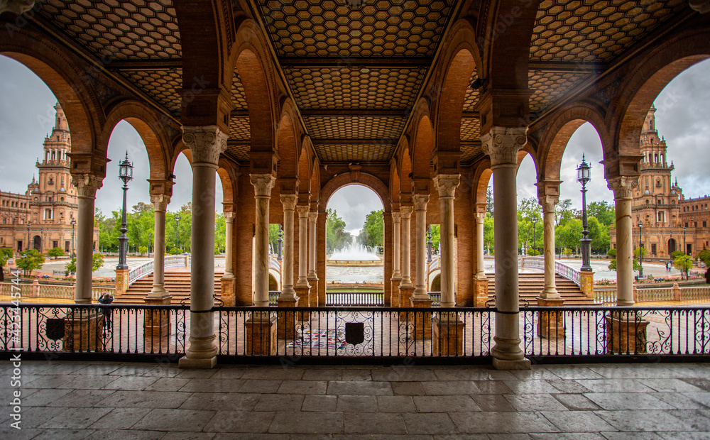 Plaza de espana Sevilla photo taken from the central base of the structure showcasing the brilliant craftmanship taken to showcase a perfectly symmetrical structure. 