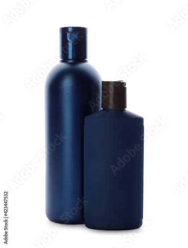 Bottles with personal hygiene products on white background