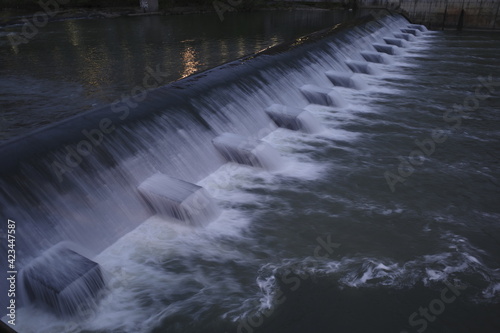 Water flowing over dam