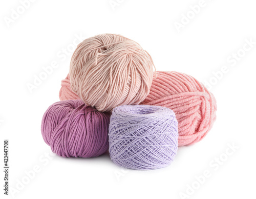 Different soft colorful woolen yarns on white background