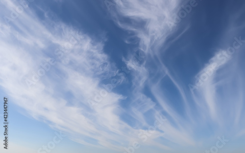 Beautiful fluffy white clouds in blue sky