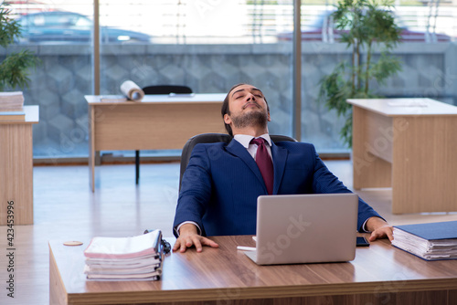 Young businessman employee working in the office