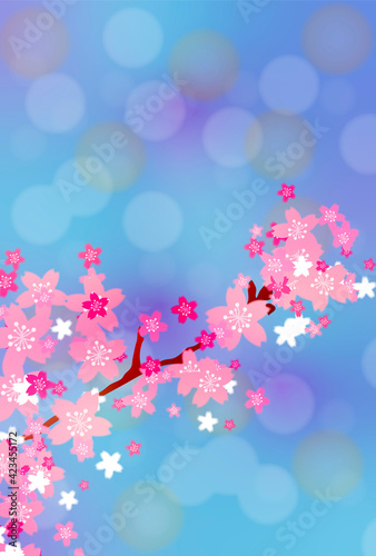 桜の花の枝のブルー背景 縦版