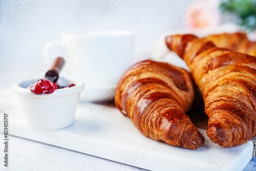 Fresh homemade Croissant served with jam, selective focus