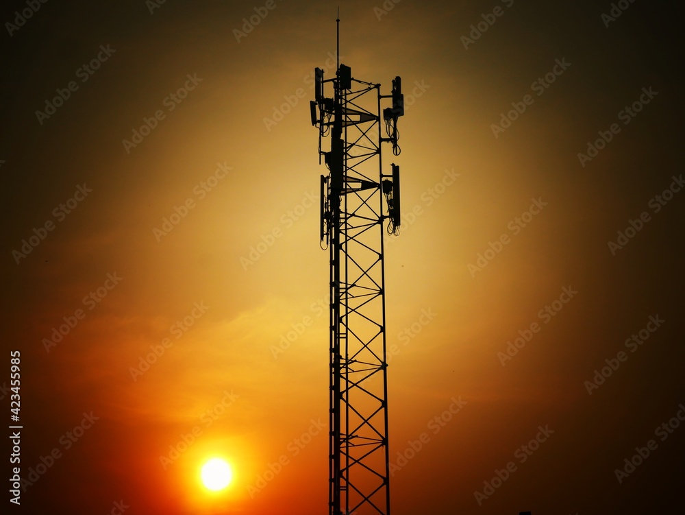 Telephone towers used to broadcast signals at dusk. Telephone towers used to broadcast signals at dusk.