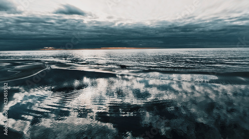 Reflection of clouds over a sea