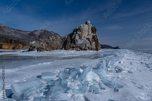 Island Baklaniy stone among ridges of ice