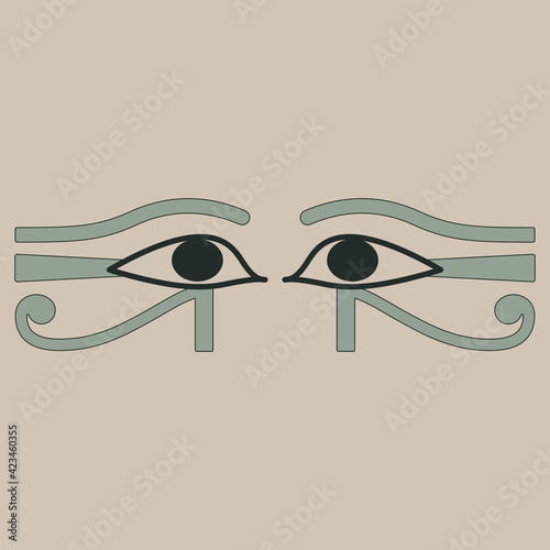 Two ancient Egyptian eyes. Wadjet. Sacred symbol of god Horus or goddess Maat.