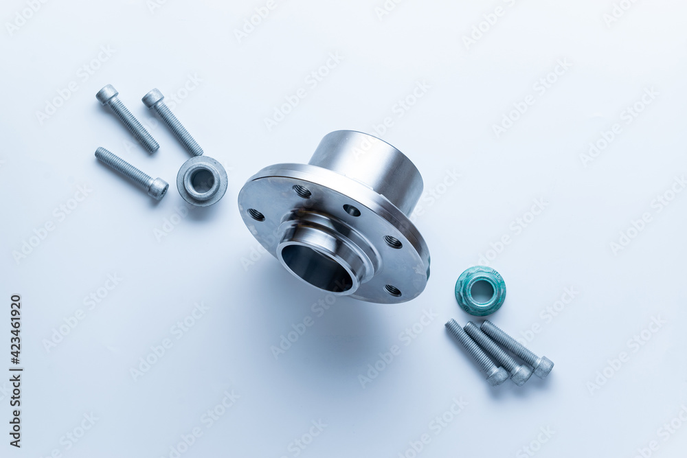 Engine gears. Auto motor mechanic spare or automotive piece on white background. Set of new metal car part. Flat lay, top view, copy space. Engine gears. Auto motor mechanic spare or automotive piece on white background. Set of new metal car part. Flat lay, top view, copy space.