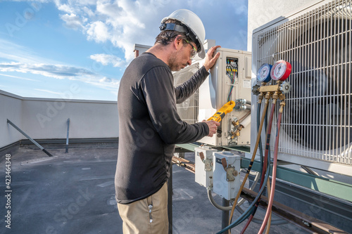 HVAC technician working on mini split