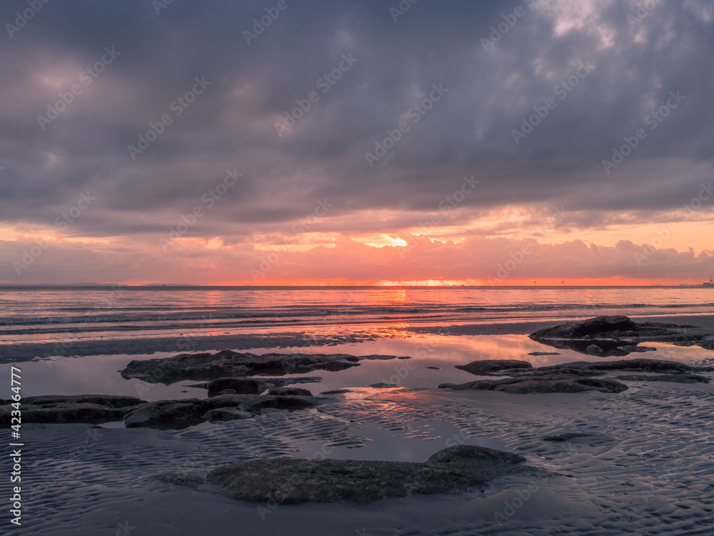 Beautiful Seaside Sunrise with Reflections