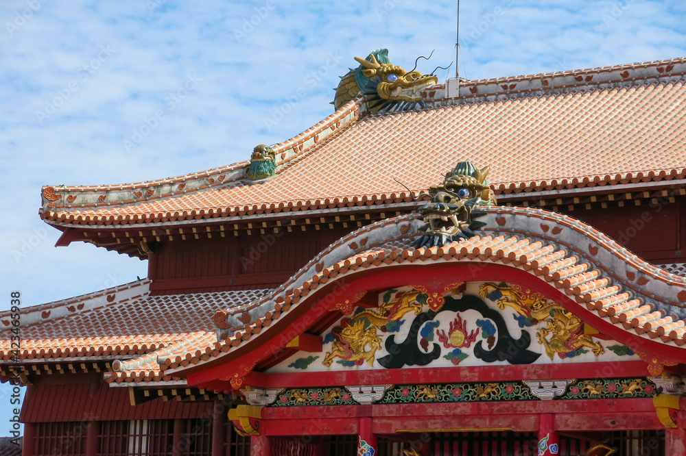 Decoration of the roof of an ancient palace with traditional dragons in the city of Okinawa on the island of Okinawa in Japan